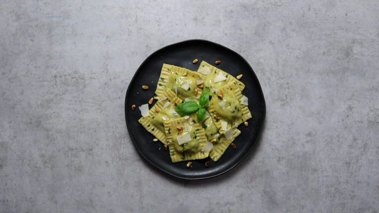 Ravioli Served on A Black Plate