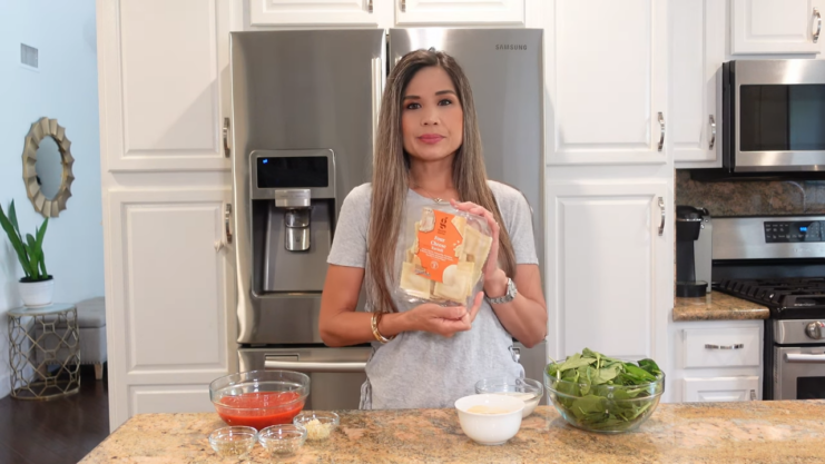 The Woman Is Holding Store-Bought Ravioli 